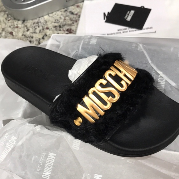 gold moschino sliders
